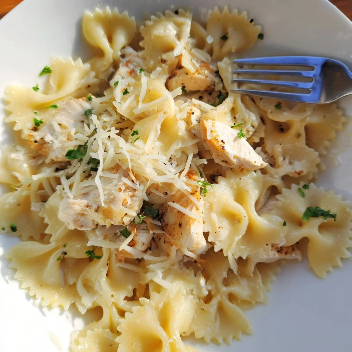Tender Mozzarella Garlic Butter Chicken Bowties with pasta in creamy sauce  