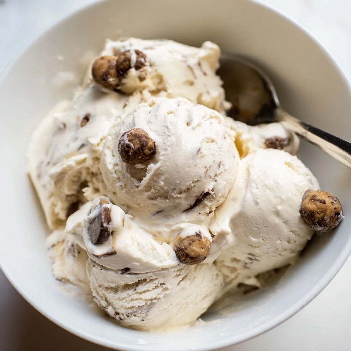 Creamy cottage cheese ice cream topped with chewy chocolate chip cookie dough balls.  