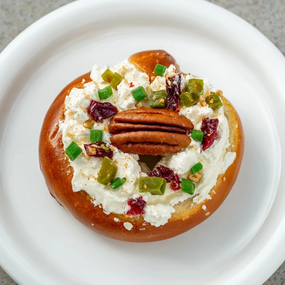 Golden Rocket Fuel New Years Eve Treats, topped with pecans, jalapeños, and cranberries for a delightful bite.
