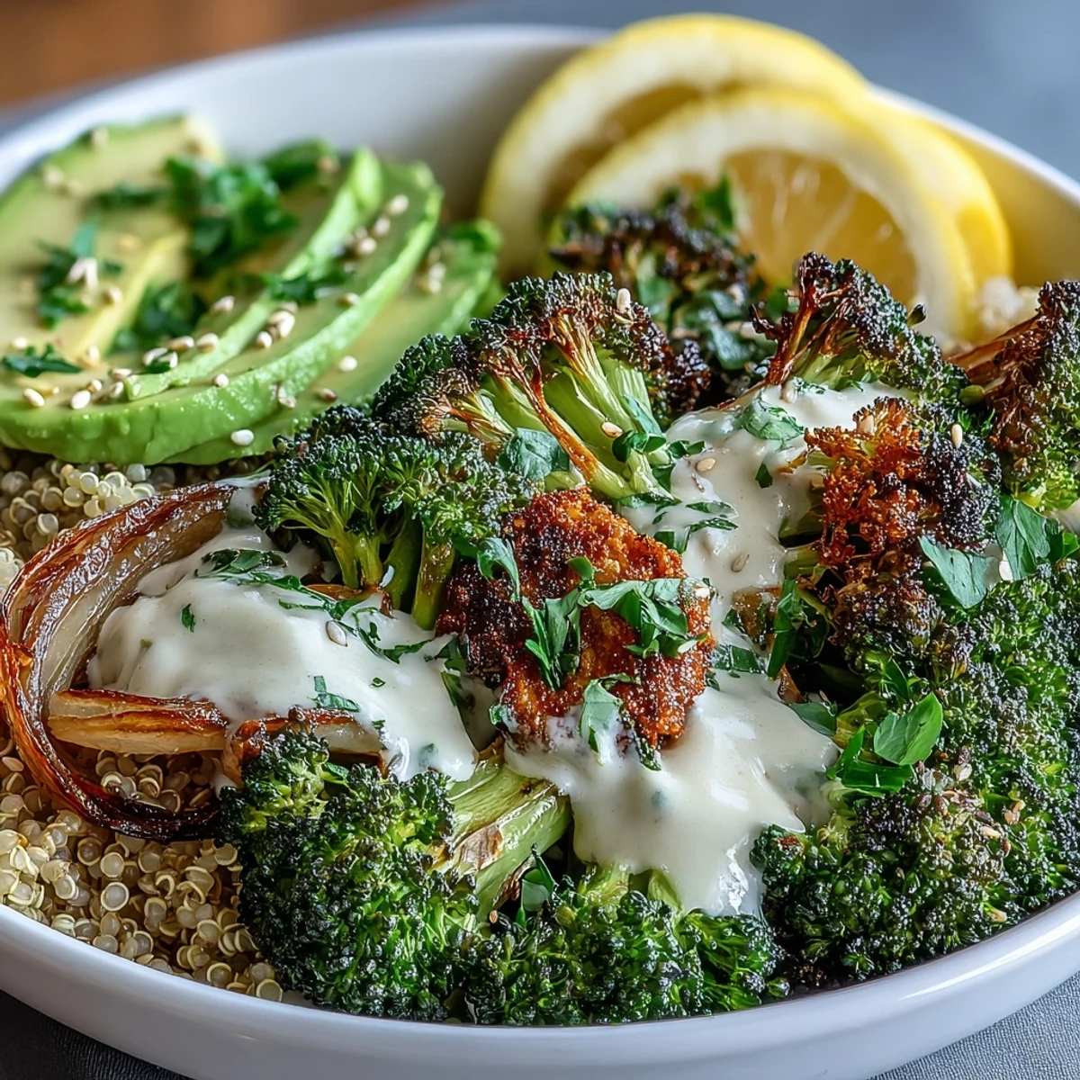 A close-up of the finished Roasted Broccoli Bowl, showcasing golden broccoli, grains, and fresh parsley garnish.  