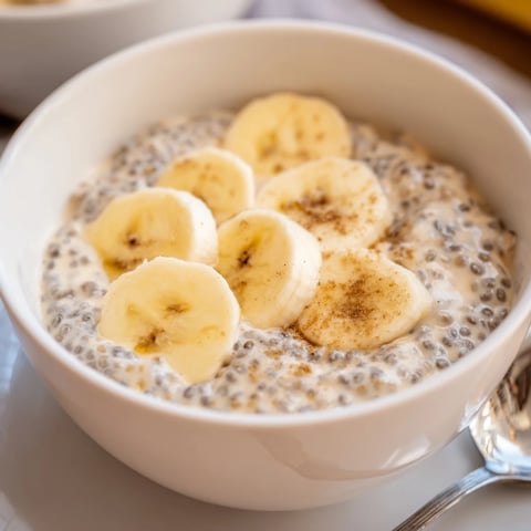 Creamy Overnight Chia Banana Pudding topped with fresh banana slices and cinnamon.  