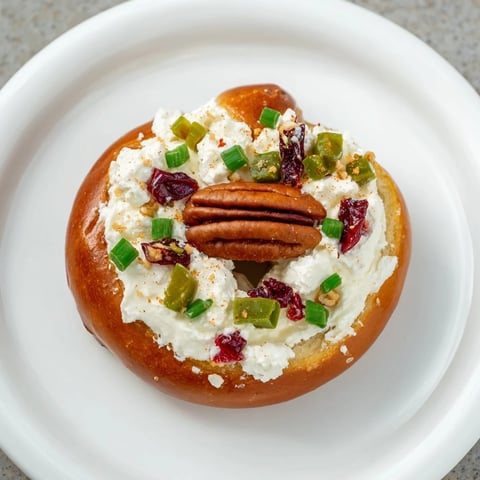 Golden Rocket Fuel New Years Eve Treats, topped with pecans, jalapeños, and cranberries for a delightful bite.