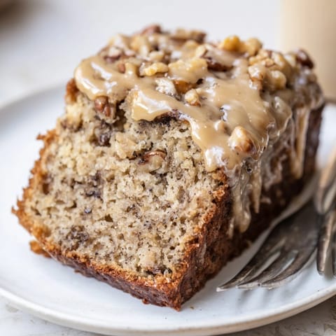 Freshly baked coffee cream banana bread, golden brown, ready to enjoy with coffee.  