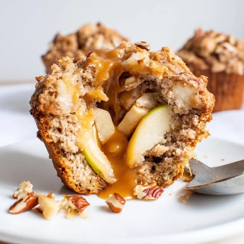 Deliciously fluffy caramel apple pecan muffins bursting with sweet apple and nutty flavors.  