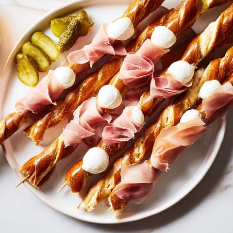 Freshly assembled fractal tree branching bread platter appetizer, ready for guests to enjoy.