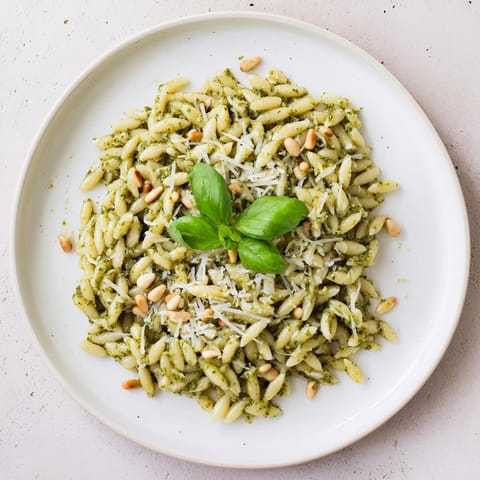 A close-up of the flavorful 15-Minute Creamy Pesto Risoni, creamy, and ready to enjoy now!