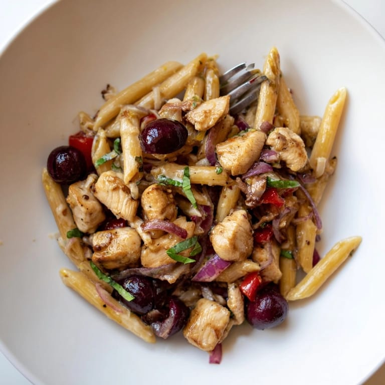 Creamy Cherry Jalape&amp;ntilde;o Chicken Pasta: Picture penne, juicy cherries, and pan-seared chicken.