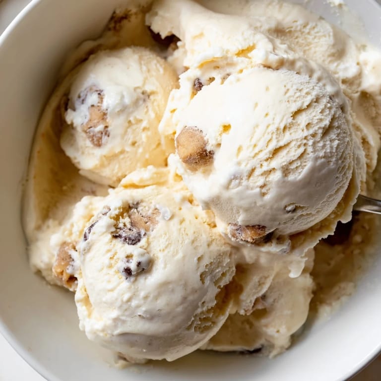 Delightful cottage cheese ice cream with chunks of edible cookie dough and maple syrup.  